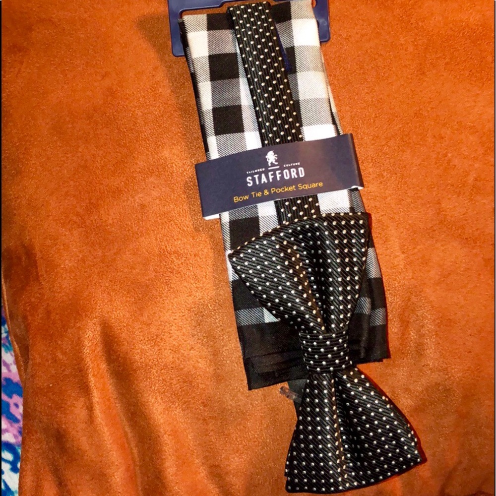 Black and white adjustable bow tie.